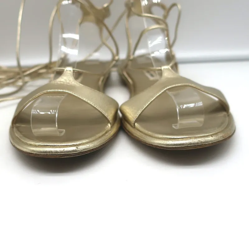 Miu Miu Flache Gladiatoren-Sandalen mit Knöchelriemen Gold Metallic Leder Größe 38.5