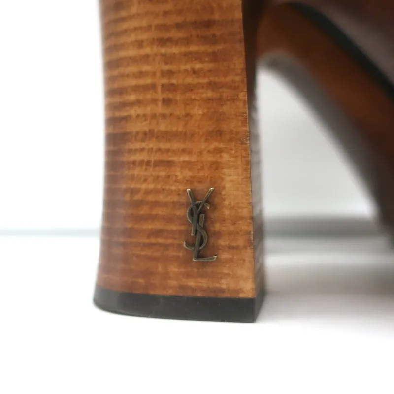 Saint Laurent Sandalen mit Kreuzriemen und Plateauabsatz aus schwarzem Leder Größe 37