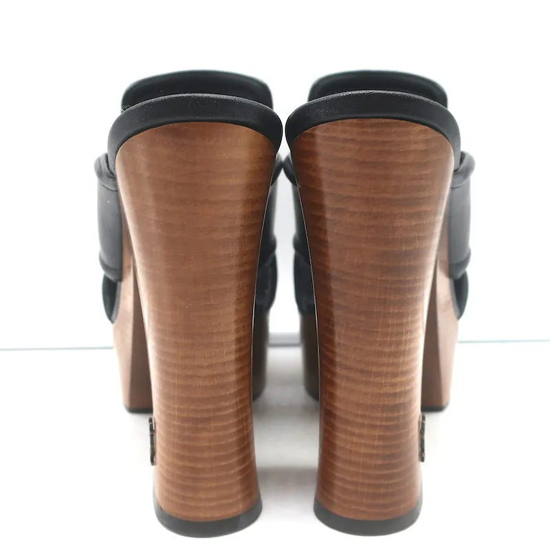 Saint Laurent Sandalen mit Kreuzriemen und Plateauabsatz aus schwarzem Leder Größe 37