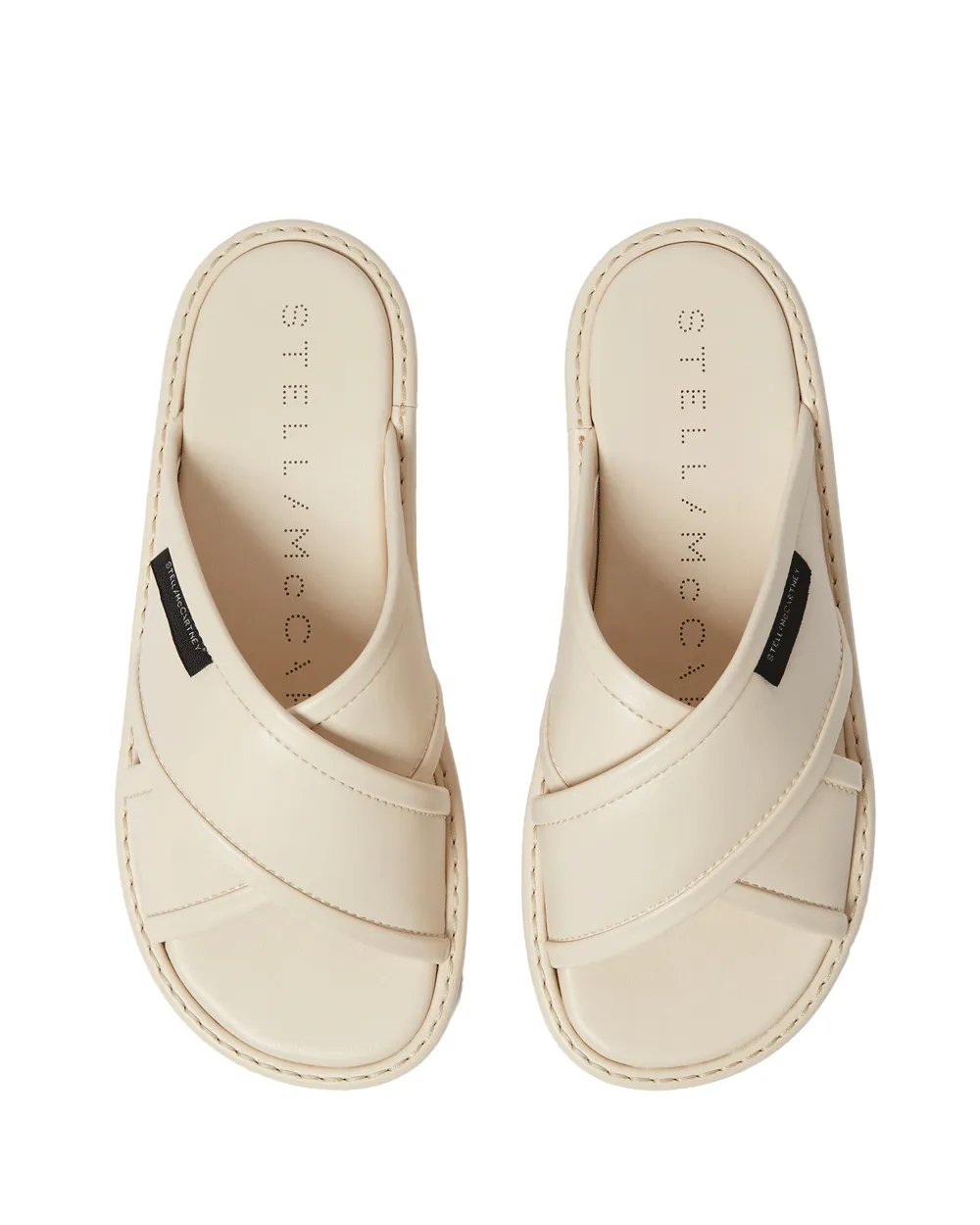 Sneak-Elyse Gedrehte Sandale in Creme